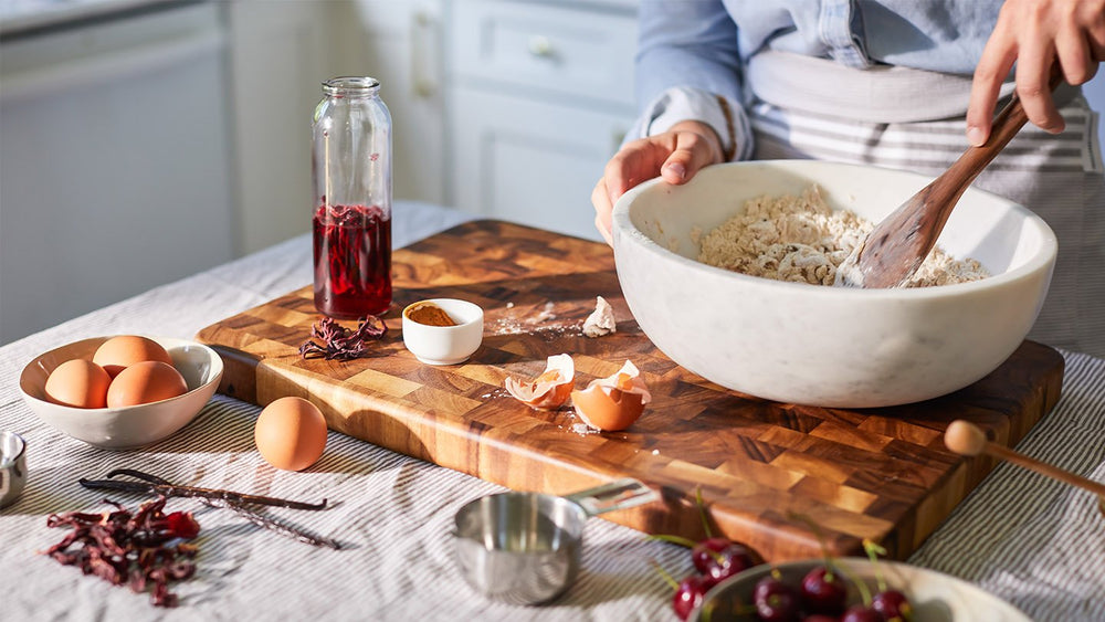 Person mixing spices