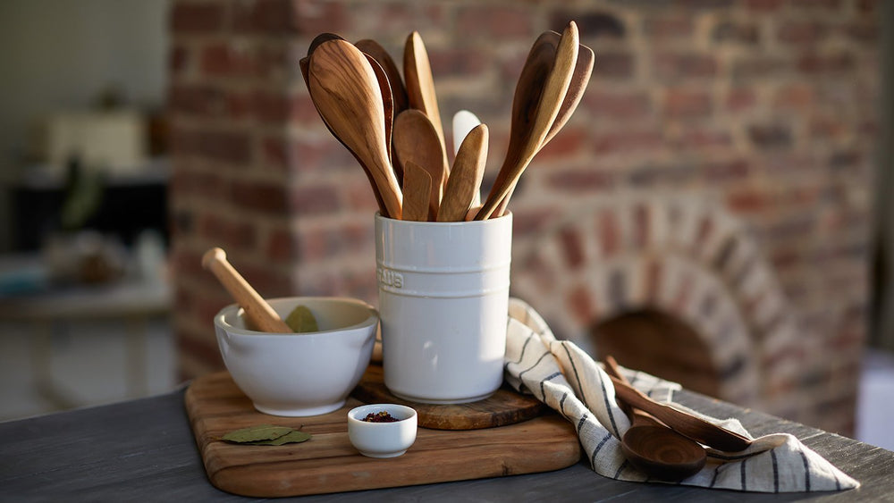 Bay leaves in a kitchen with spoons.